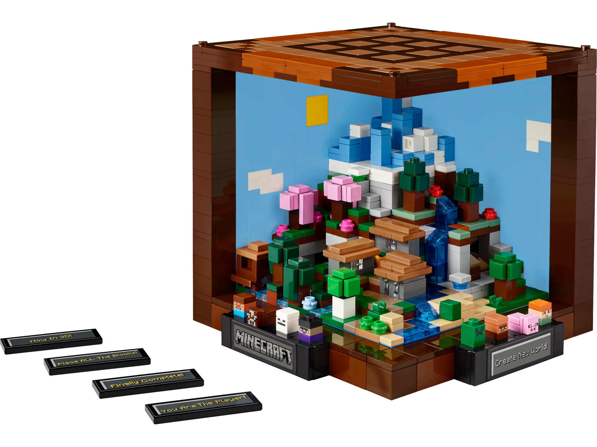 LEGO Minecraft 21265 L'établi ouvert montrant le diorama intérieur avec paysage montagneux, arbres, cascade et mini-figurines avec plaques décoratives