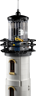 Gros plan sur le sommet du phare LEGO 21335 avec lanterne transparente, balcon et minifigurine du gardien avec longue-vue