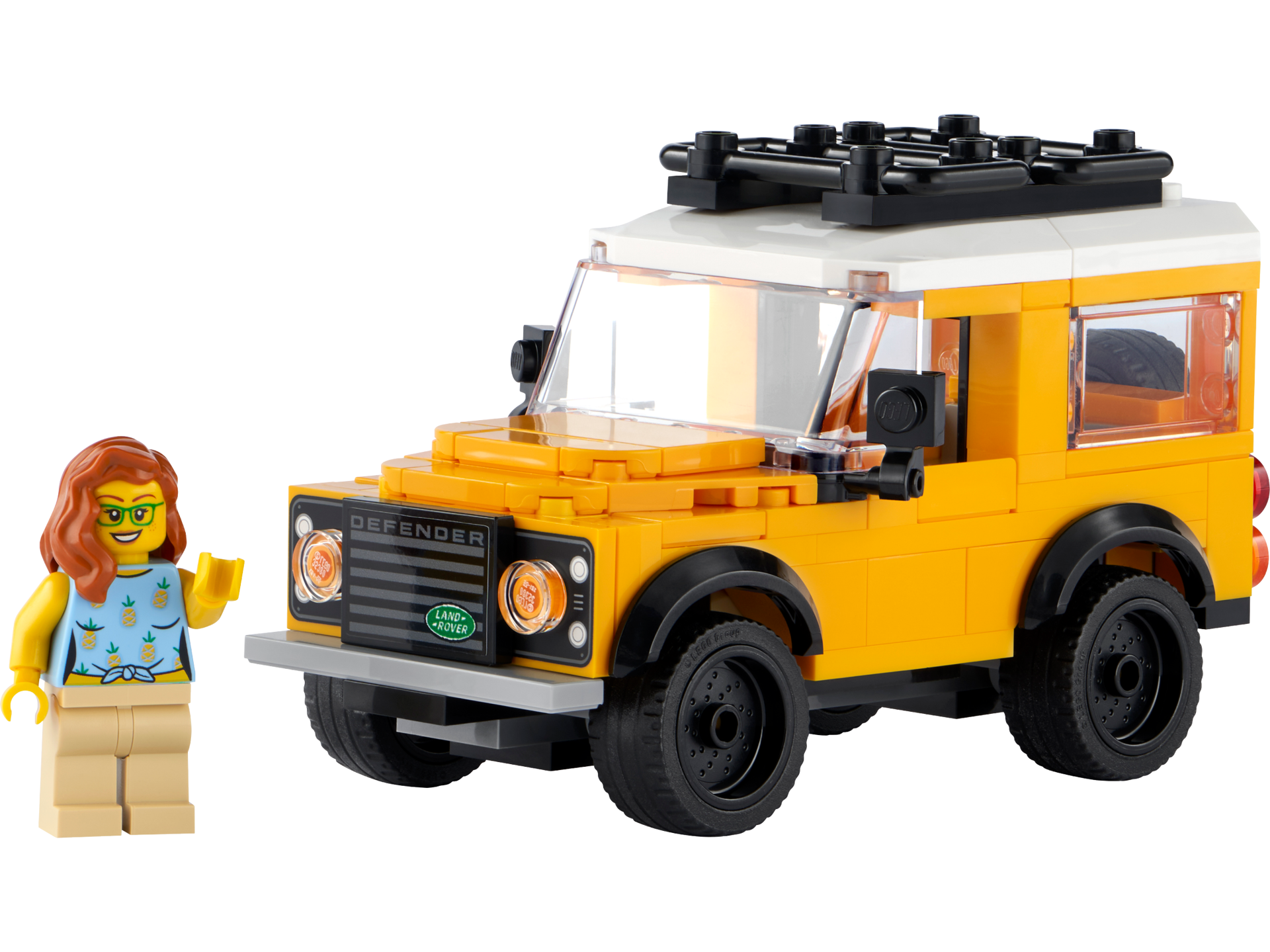 LEGO 40650 Land Rover Classic Defender jaune avec toit blanc, galerie noire et minifigurine féminine aux cheveux roux