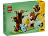 Dos de la boîte LEGO 40709 montrant les détails du set, la cachette dans l'arbre et le toboggan avec fonctions de jeu
