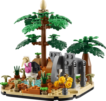 Diorama LEGO savane africaine 40784 avec palmiers, éléphant gris, autruche et point d'eau entourés de végétation
