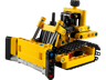 Vue de face du bulldozer LEGO Technic 42163 jaune avec lame et chenilles noires détaillées