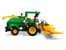 Vue latérale de l'ensileuse LEGO Technic John Deere 9700 avec flèches illustrant les fonctions mécaniques des roues et du bec