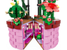 Vue rapprochée de l'intérieur du pot de fleurs LEGO ouvert montrant les détails des pièces roses, colonnes dorées et vase vert