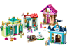 LEGO Disney 43246 vue d'ensemble du marché des princesses avec quatre boutiques, fontaine et mini-poupées Tiana, Ariel, Aurore et Cendrillon