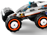 Gros plan sur la suspension avant articulée du rover LEGO City 60431 montrant le mécanisme de roue pivotante et le cockpit avec minifigurine