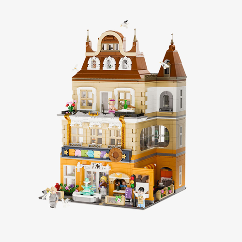 Vue d'ensemble de la boulangerie européenne Pantasy 85013 avec façade détaillée, fontaine, minifigurines et toit brun à tourelles