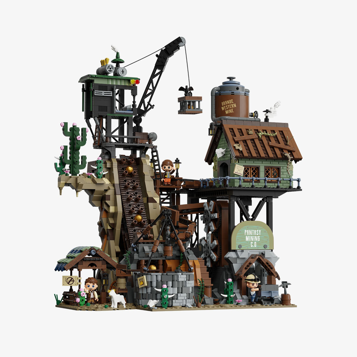 Vue d'ensemble du set Pantasy 85025 Western Mine avec grue, bâtiments miniers, cactus et figurines sur fond blanc