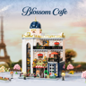 Présentation du Pantasy Blossom Café avec décor parisien, cerisiers en fleurs et Tour Eiffel en arrière-plan