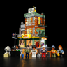Six minifigurines du set Record Store alignées devant le bâtiment éclairé avec accessoires musicaux dont DJ, musiciens et passants
