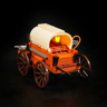 Vue avant du chariot bâché western orange avec bâche blanche, grandes roues marron et éclairage LED intérieur