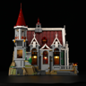 Vue de face du château médiéval Lumibricks L9071 sur fond noir montrant la façade avec tour, vitraux et éclairage LED