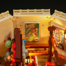 Vue intérieure du chapiteau Lumibricks avec affiches vintage de Jenny la femme à barbe et Mira la voyante éclairées par LED