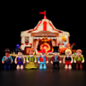 Sept figurines du set Lumibricks L9079 alignées devant le chapiteau : cow-boy, acrobate, femme à barbe, clown, monsieur Loyal et enfants