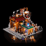 Vue en perspective de l'Ore Factory illuminée sur fond noir avec rails, minifigurines steampunk et éclairage LED bleu et chaud
