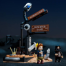 Scène avec figurine d'enfant devant l'entrée du château, robot mécanique et panneau Deserted Land