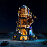 Vue de face du Château Mobile de l'Alchimiste avec figurine d'enfant et éclairage ambiance nocturne