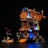 Château Mobile de l'Alchimiste Lumibricks éclairé sur fond noir avec panneaux Alchemy Lab et Deserted Land