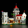Vue intérieure du château médiéval Lumibricks L9119 éclairé avec marché couvert, figurines et bâtiment à toit rouge sur fond noir
